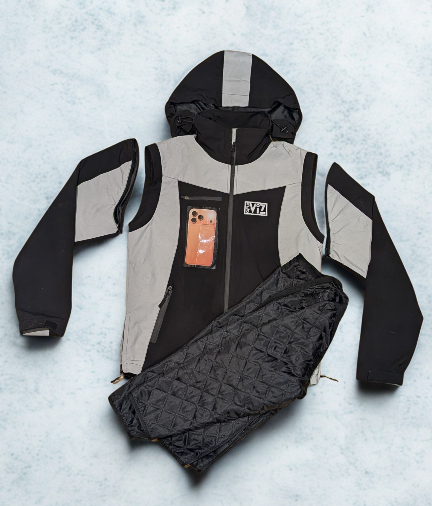 Preorder Now: The CapturViz Reflect/Deflect  3-in-1 Coat - Reflective, Water & Windproof, Versatile 3 Ways To Wear, Removable Liner & Sleeves, POV Clear Phone Pocket, Hidden Back Pack & Hood, Waterproof Zips.