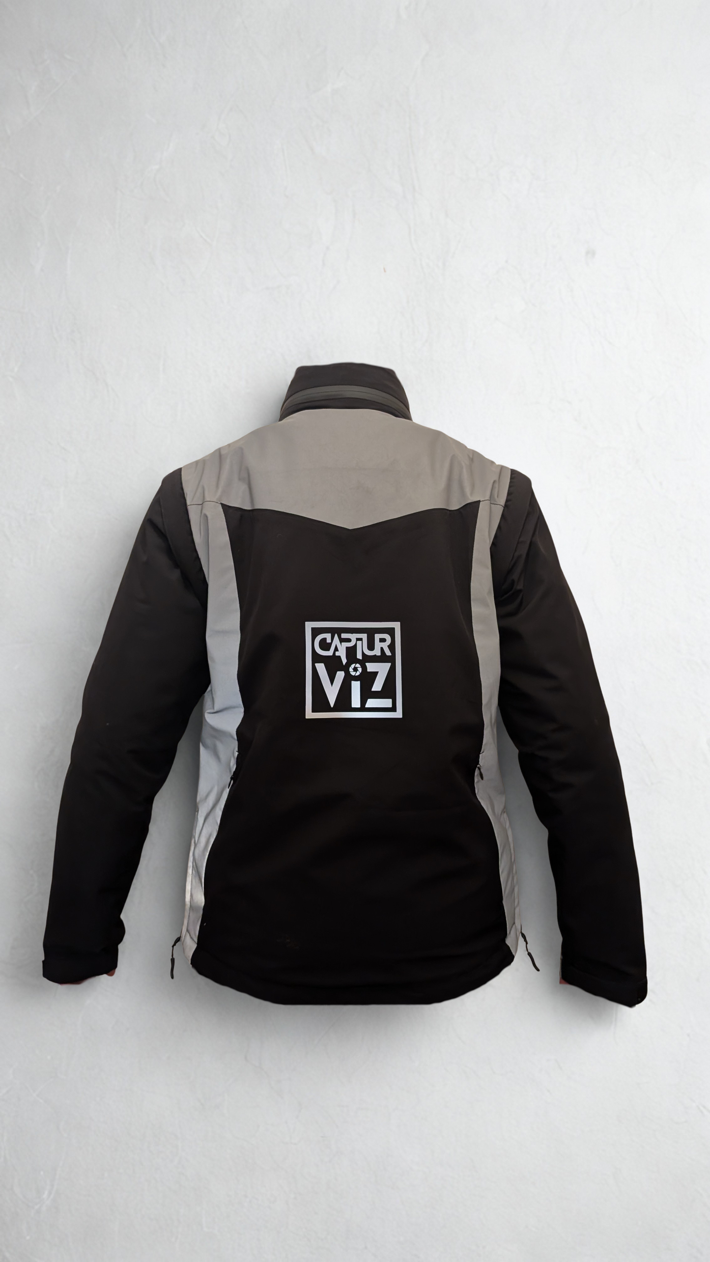 Preorder Now: The CapturViz Reflect/Deflect  3-in-1 Coat - Reflective, Water & Windproof, Versatile 3 Ways To Wear, Removable Liner & Sleeves, POV Clear Phone Pocket, Hidden Back Pack & Hood, Waterproof Zips.